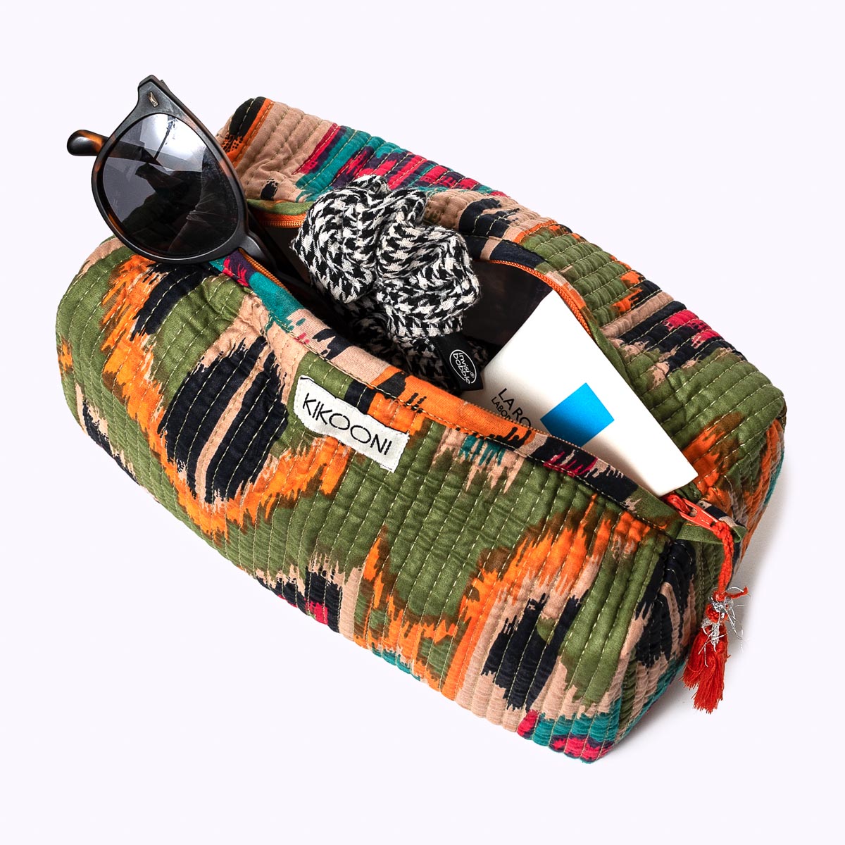 "green ikat" cosmetic bag