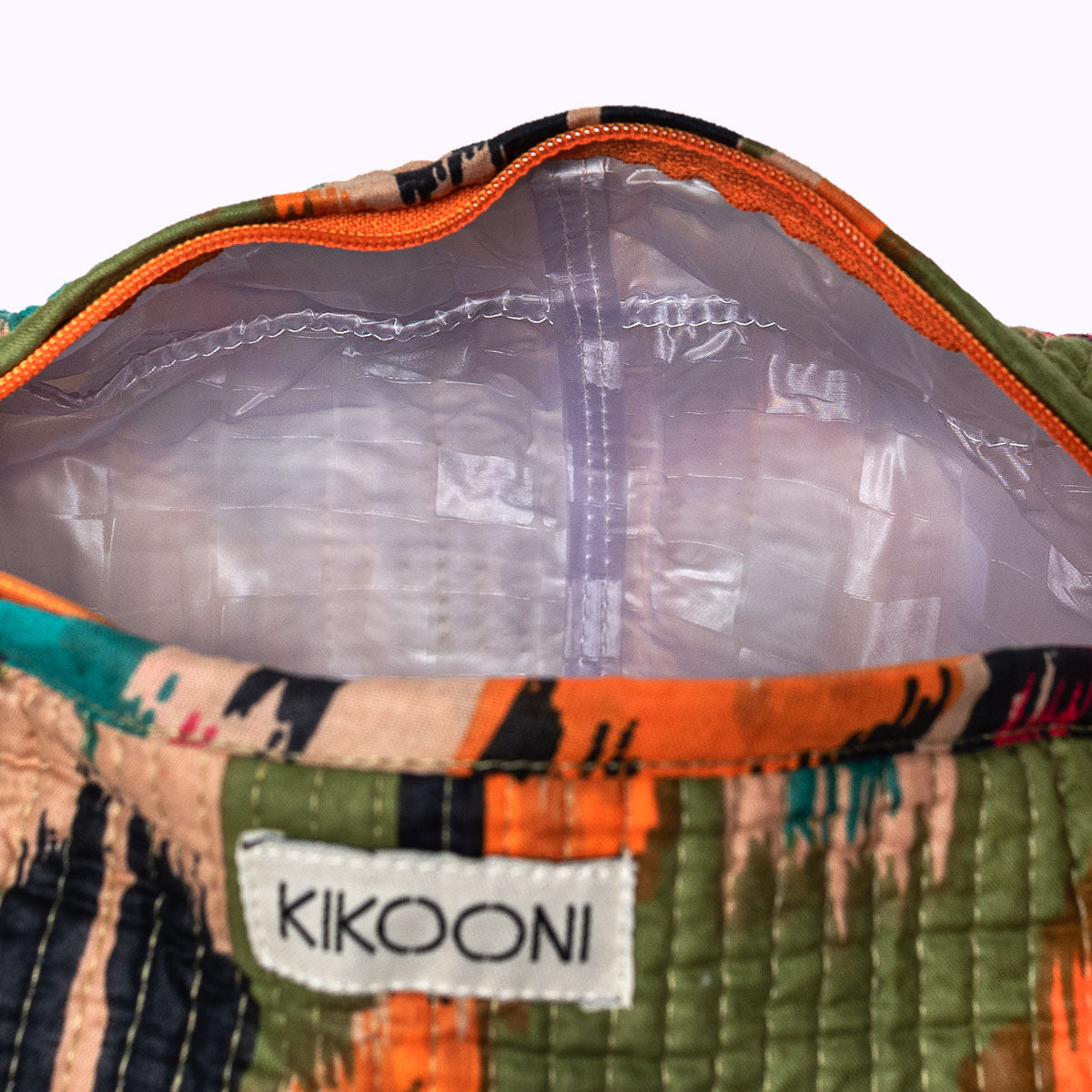 "green ikat" cosmetic bag
