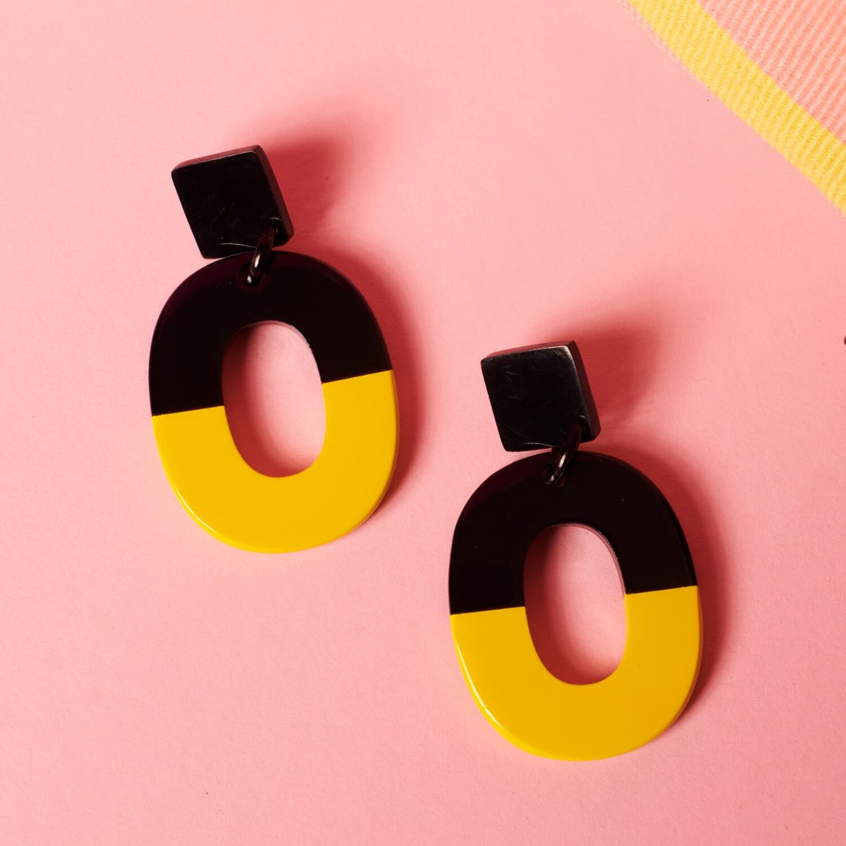 "Nhi" horn earrings